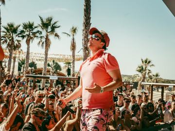 Performer on stage above a daytime crowd – Czech-Slovak Zrće Festival, Zrće Beach