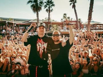 Performers on stage with palm trees behind – Czech-Slovak Zrće Festival, Zrće Beach