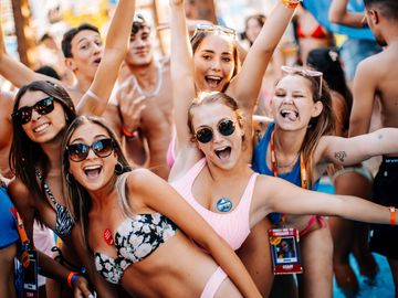 Girls cheering at an afternoon pool party – Nomad Beach Club, Zrce Beach