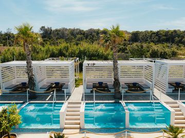 VIP cabanas with private jacuzzis in a row – Nomad Beach Club, Zrce Beach