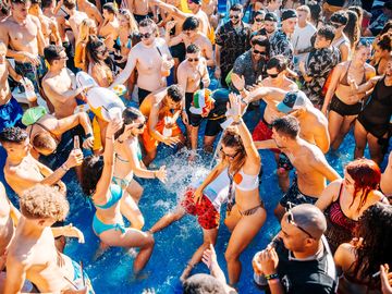 Guests dancing in the pool in the afternoon – Nomad Beach Club, Zrce Beach