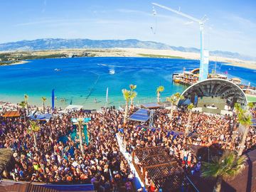 Aerial view of the club full of people by the sea – Papaya Club, Zrće Beach