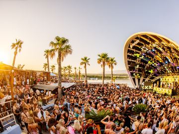 Arch stage at sunset with palm trees – Papaya Club, Zrće Beach