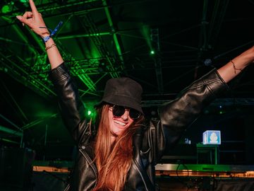 Guest cheering under green lights – Symbol Beach Club, Zrce Beach